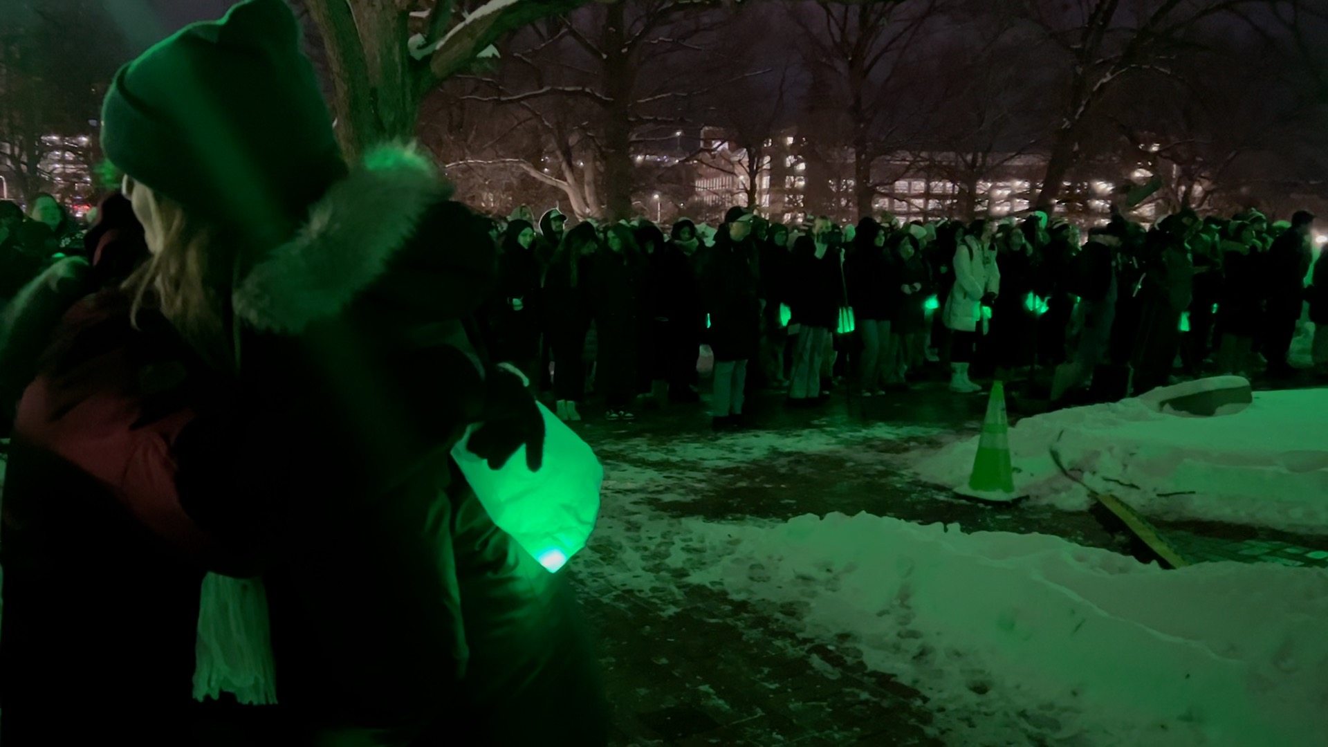 Leah and Emma Irion hug as remembrance ceremony at MSU ends