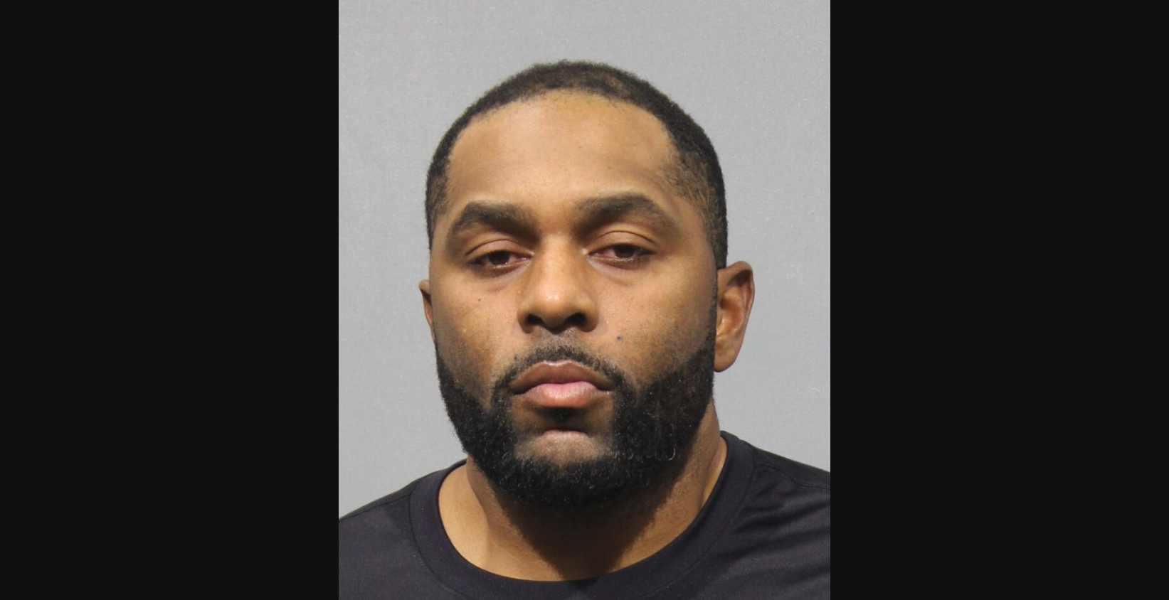 Sherrone Moore booking photo