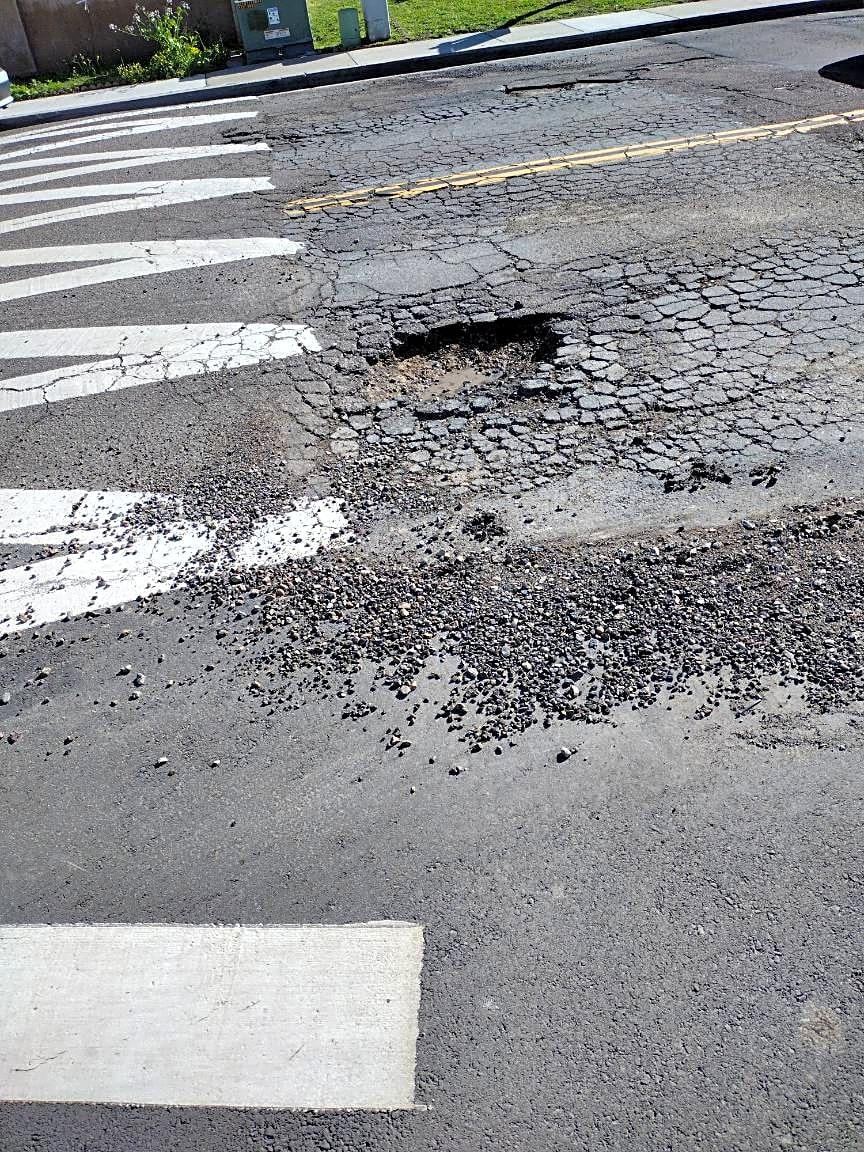 An already existing pothole reported on the "Get it Done" portion of the City of San Diego's website. 