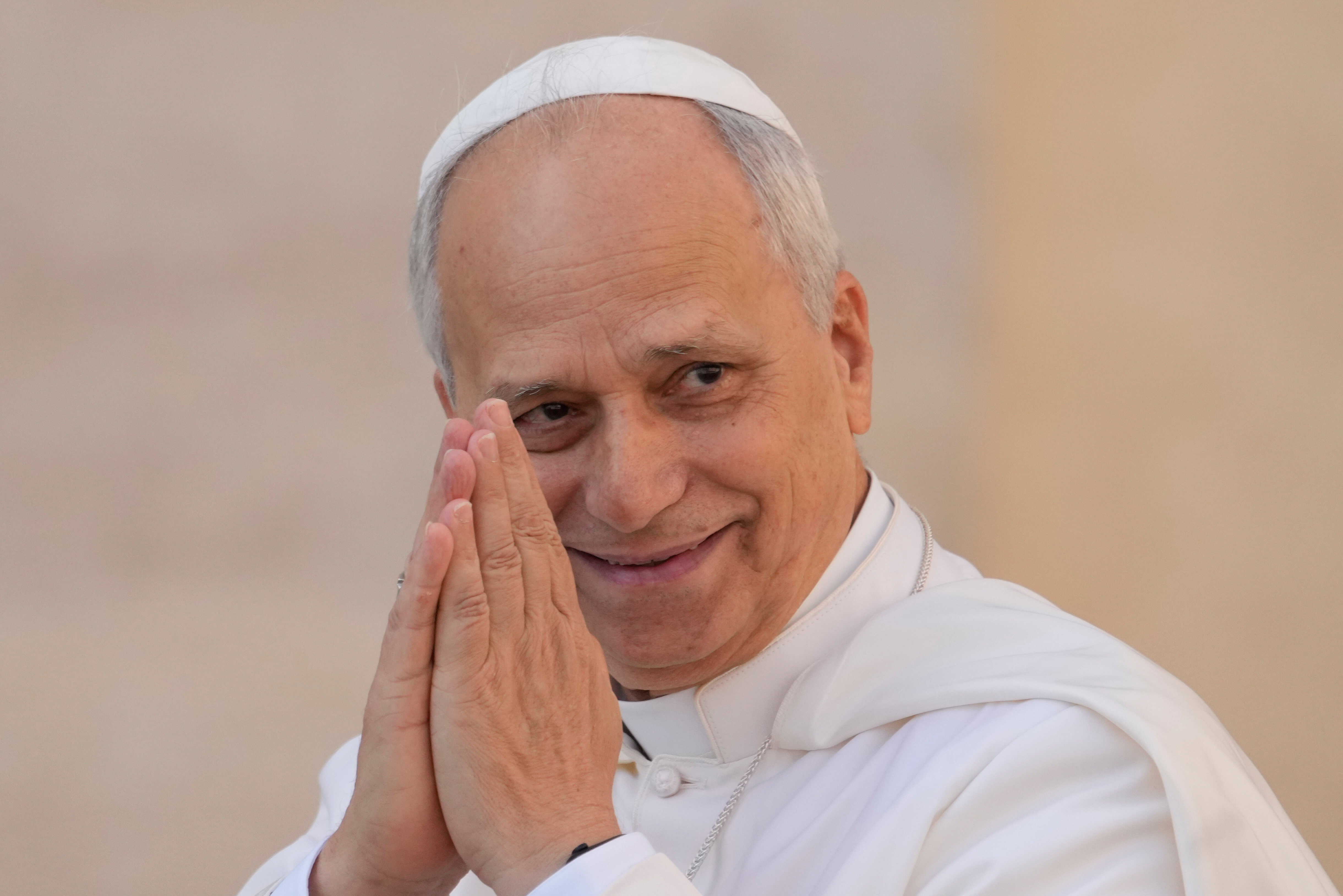 Pope Leo XIV gestures as he arrives for his weekly general audience in St. Peter's Square at The Vatican, Wednesday, Oct.1, 2025. 