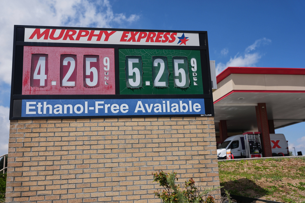 The per-gallon prices for regular unleaded and diesel fuel are displayed on a sign outside a Murphy Express gasoline station, Tuesday, April 28, 2026, in Centennial, Colo. 