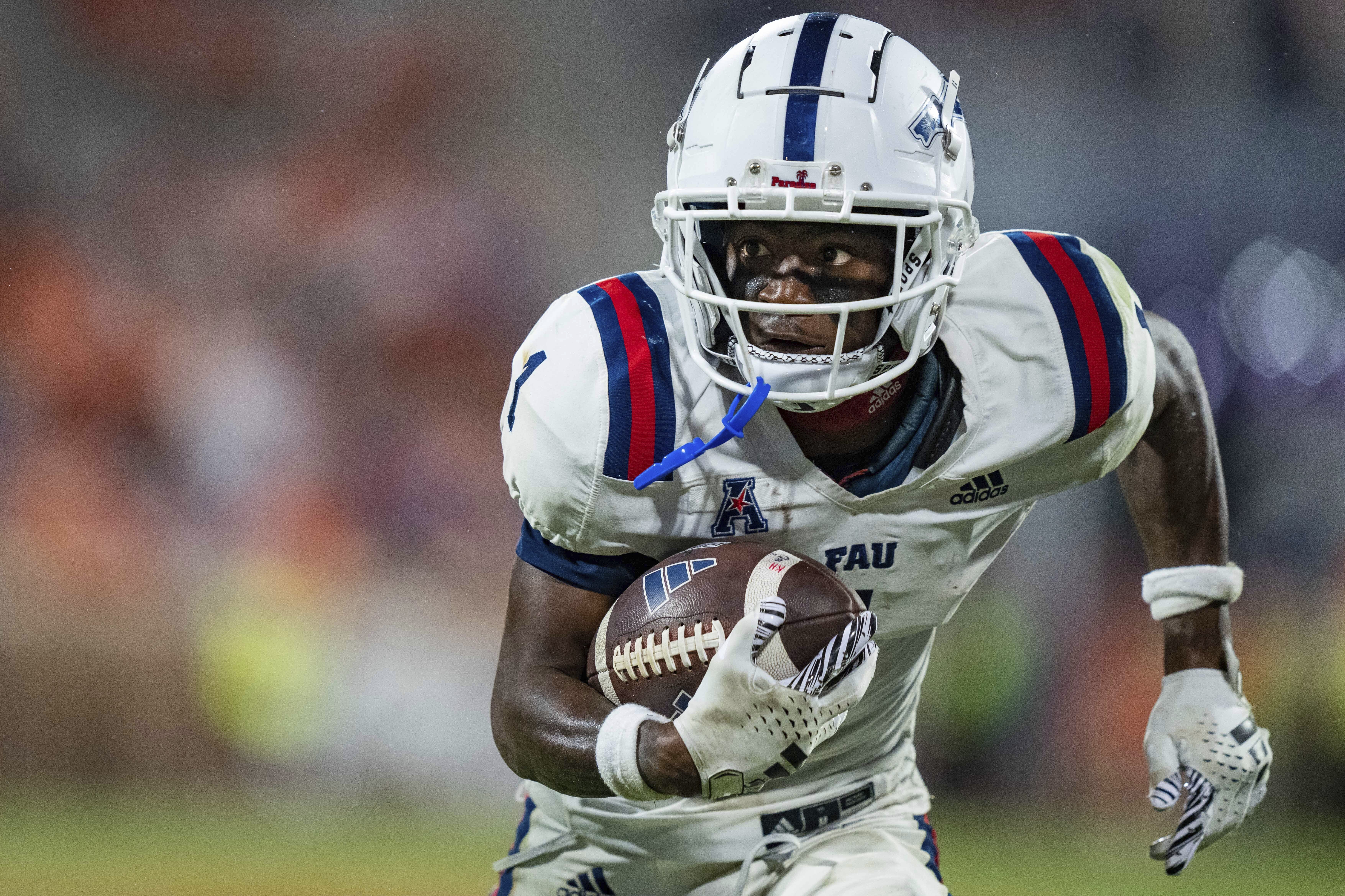 FAU Owls receiver LaJohntay Wester runs with football at Clemson Tigers, Sept. 16, 2023