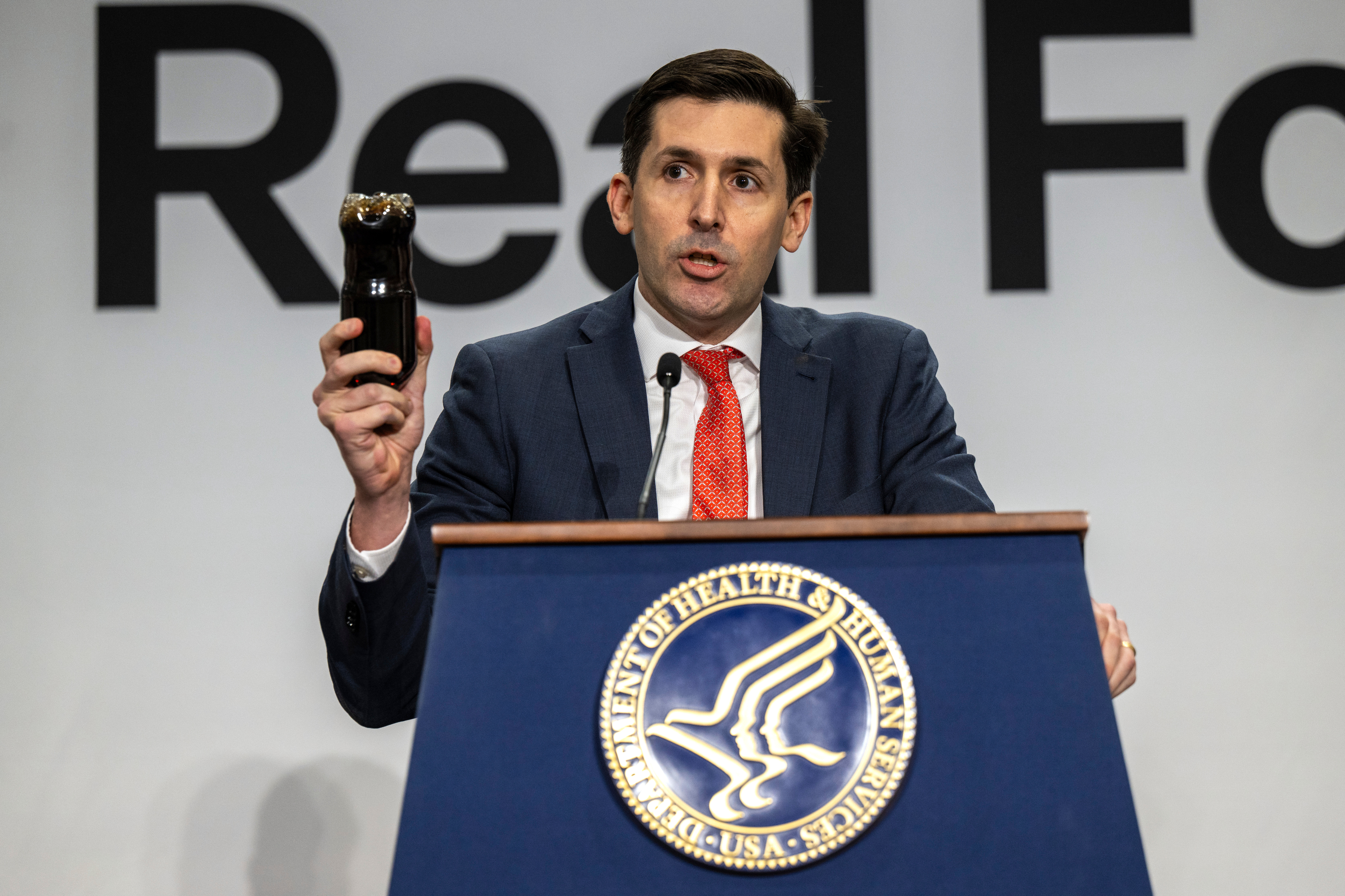 In this image provided by the U.S. Department of Agriculture, Calley Means, senior advisor for the U.S. Department of Health and Human Services, delivers remarks at HHS Headquarters in Washington, Feb. 11, 2026.