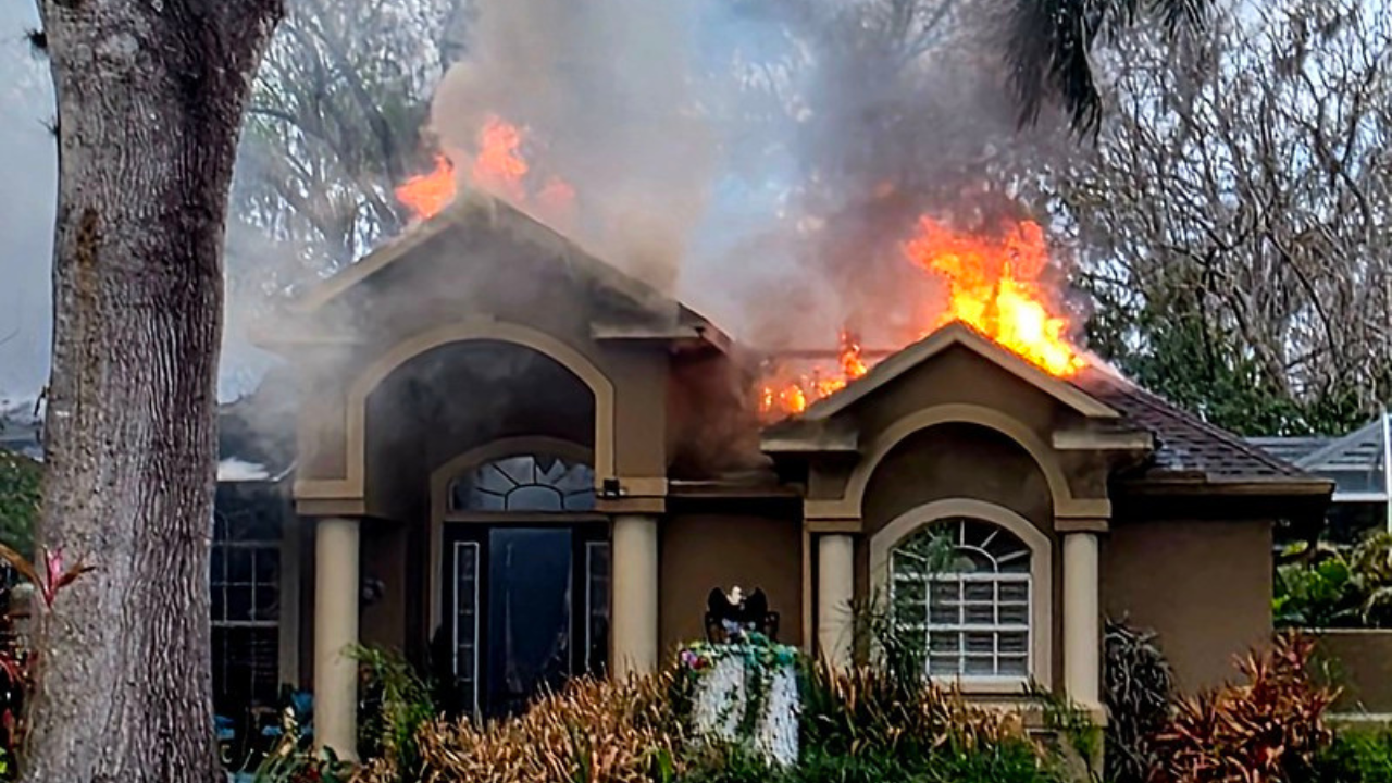 Fire crews battle two-alarm house fire in Lutz