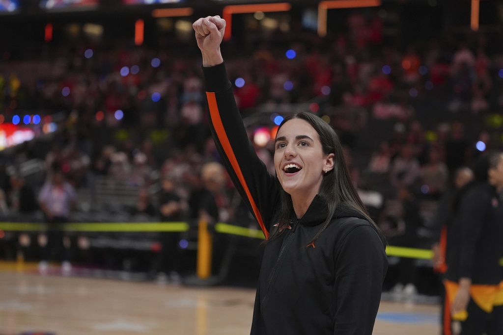 Indiana Fever's Caitlin Clark reacts to fans before the WNBA All-Star basketball game, Saturday, July 19, 2025, in Indianapolis. 