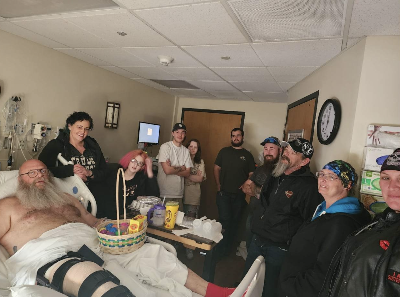 Friends visiting Shawn in the hospital