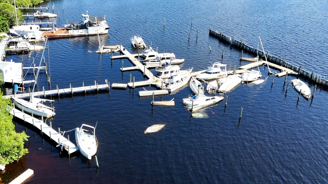 Aerial view of the derelict boats in the marina