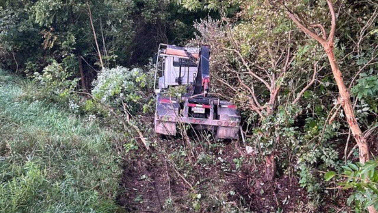 Semi hits parked car and lands in ditch on US-131 3.jpg