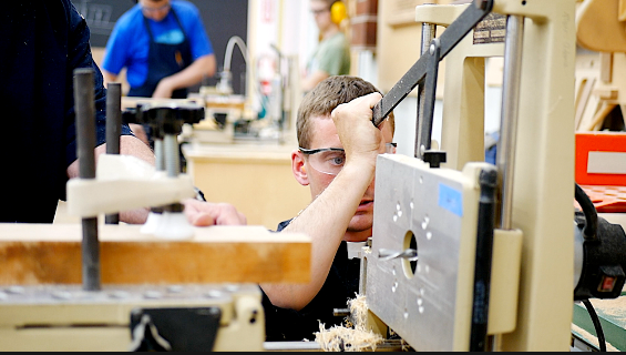 Brother Mark helps student