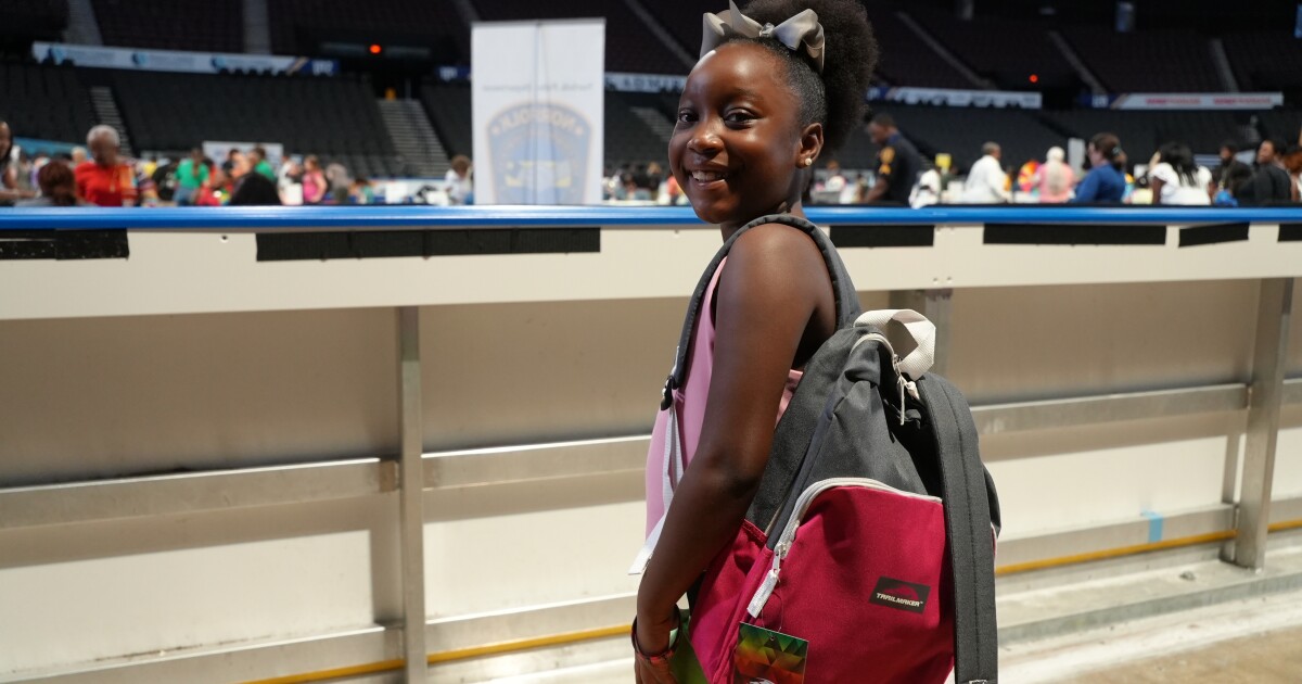 Norfolk families prepare for school year with free backpacks, shoes and more at annual back-to-school event