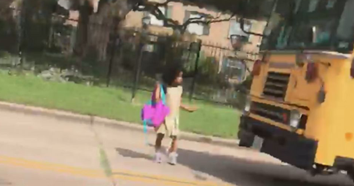 Driver arrested after nearly hitting girl getting off school bus ...