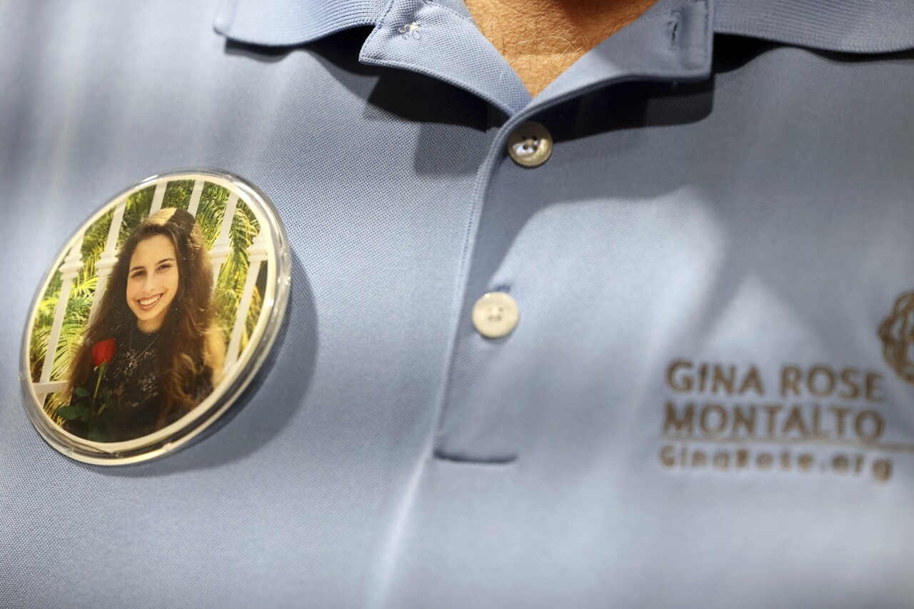 Tony Montalto wears button of daughter Gina Montalto, Oct. 20, 2021