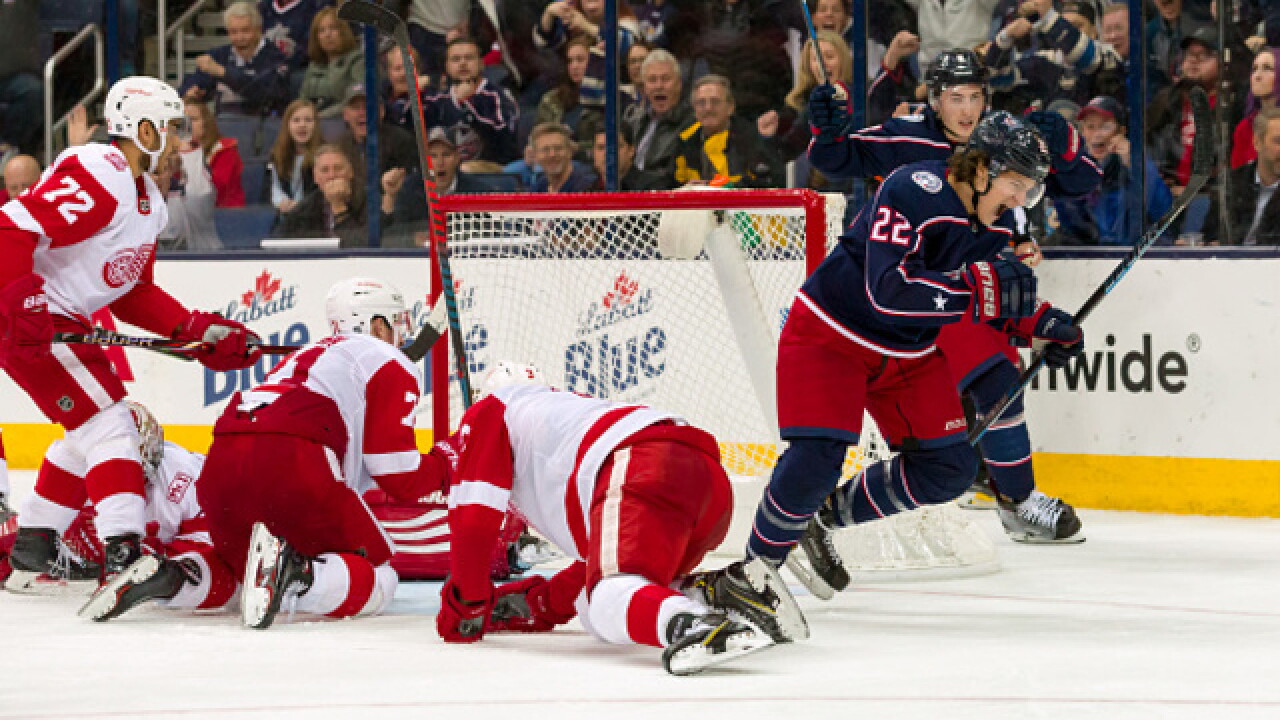 Red Wings collapse late, lose in overtime