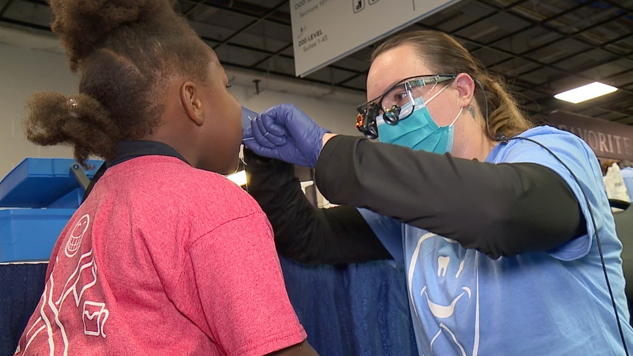 Dozens of children get free dental care at clinic at Tropicana Field
