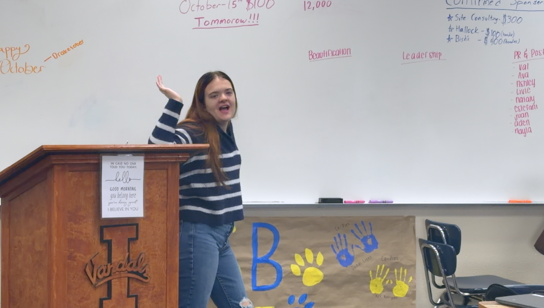 Alice Arnold making announcements during Student Council