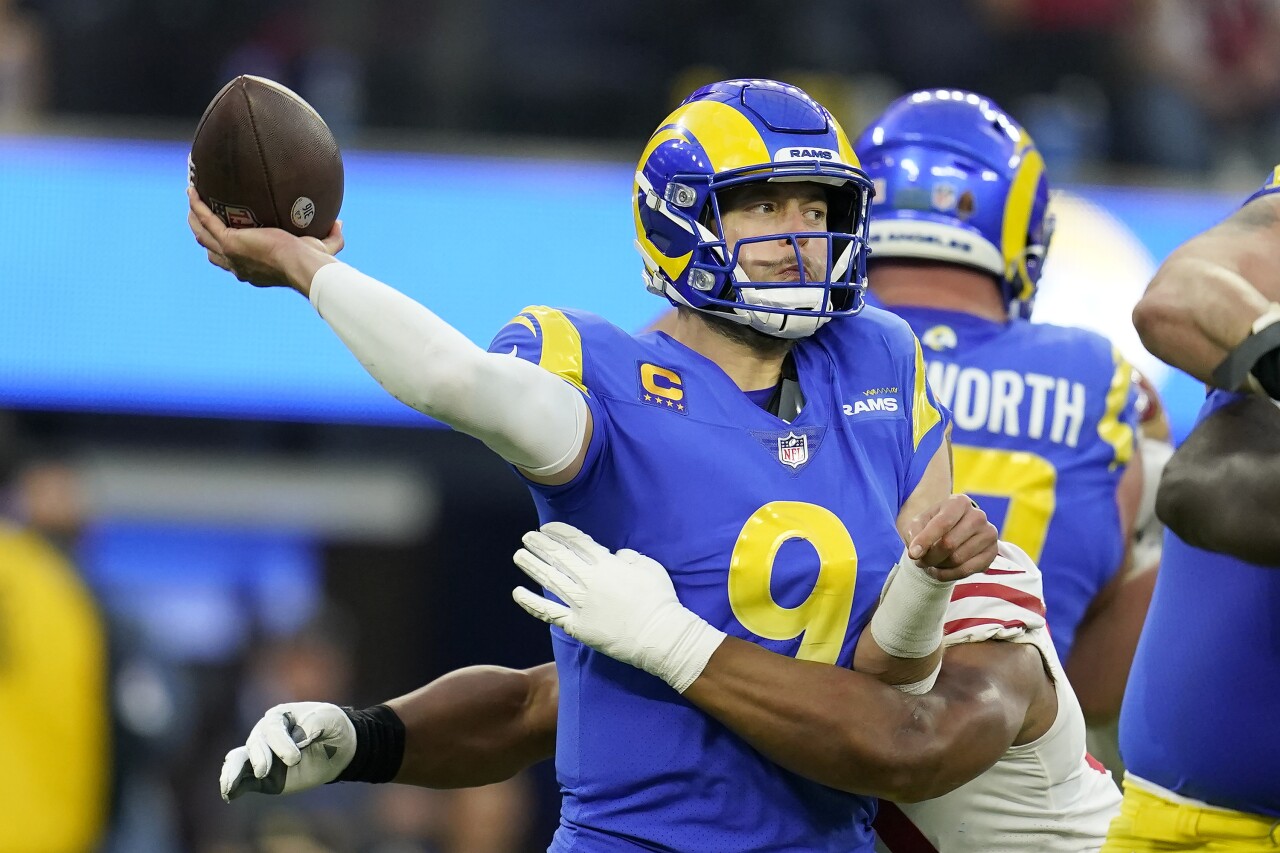 Los Angeles Rams QB Matthew Stafford throws under pressure vs. San Francisco 49ers in NFC Championship, Jan. 30, 2022