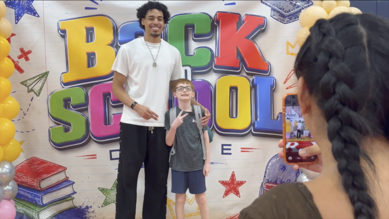 Julian Strawther backpack giveaway at Liberty High School