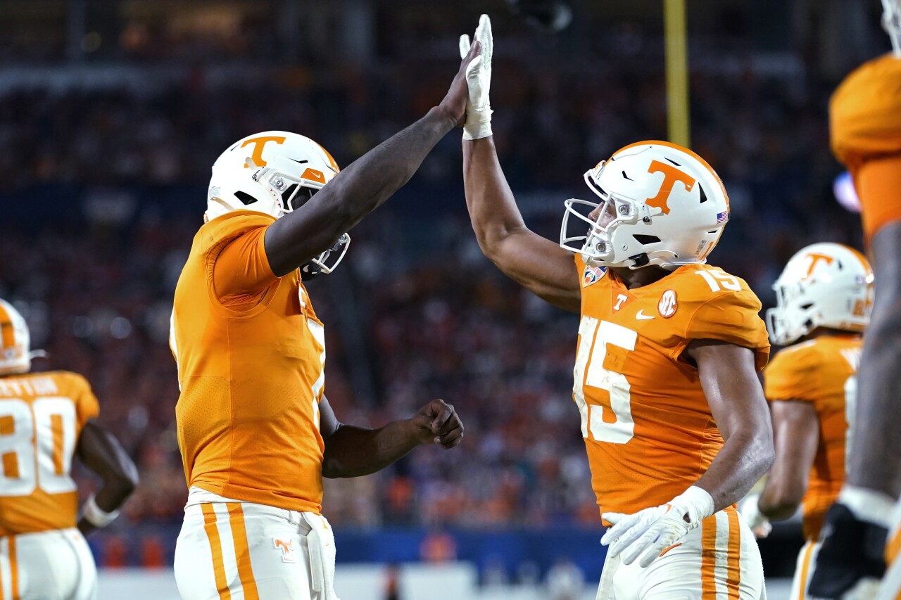 Tennessee Volunteers QB Joe Milton celebrates with receiver Bru McCoy after TD in first quarter of 2022 Orange Bowl