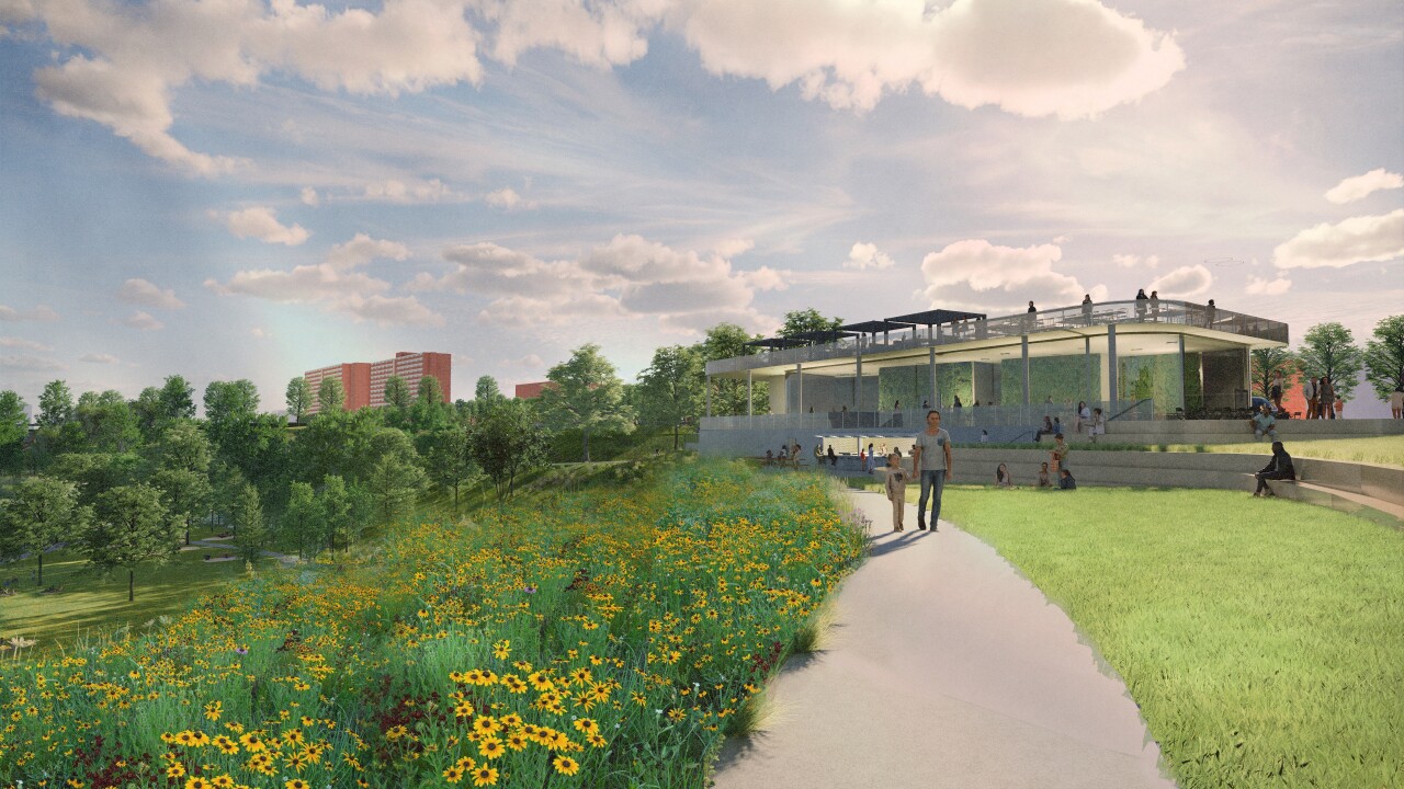 A rendering of Irishtown Bend Park shows a planned plaza and amphitheater. The Riverview Tower housing complex is visible in the background, on the left side.