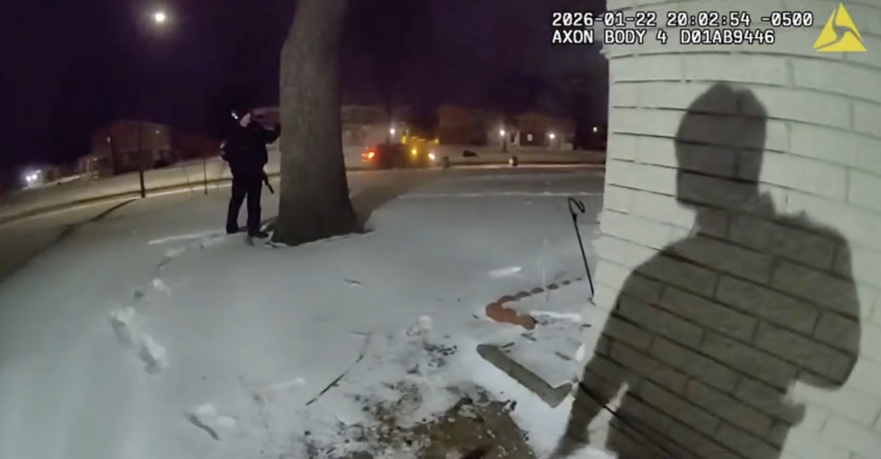 Officers hiding from the showering of bullets