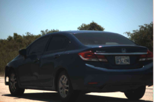 Blue in color 2015 Honda Civic with Oklahoma plates DLH434 2.png