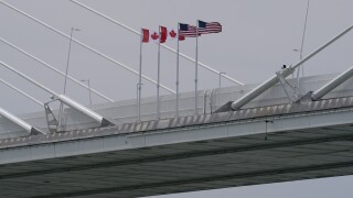 Gordie Howe Bridge canadian american flags