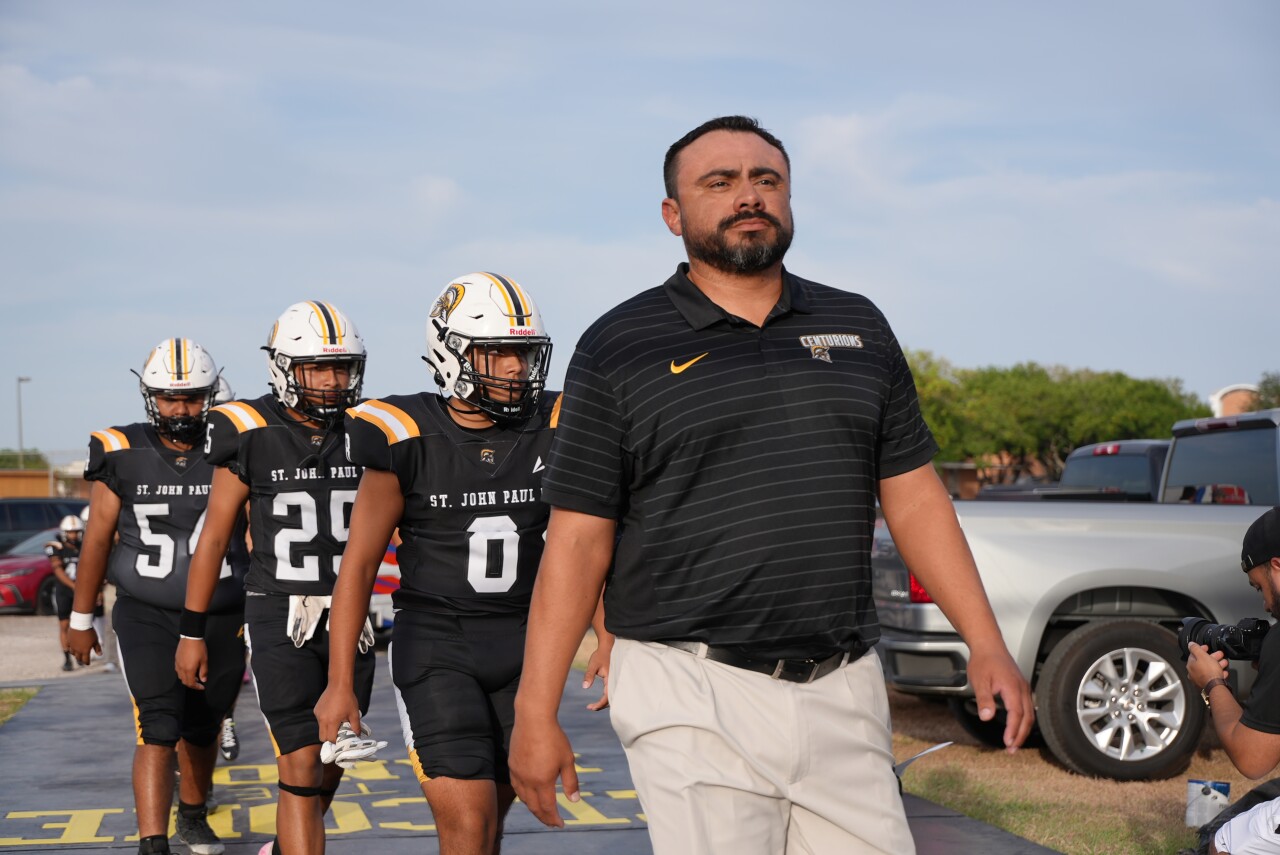 St. John Paul II football head coach Roland Ramirez