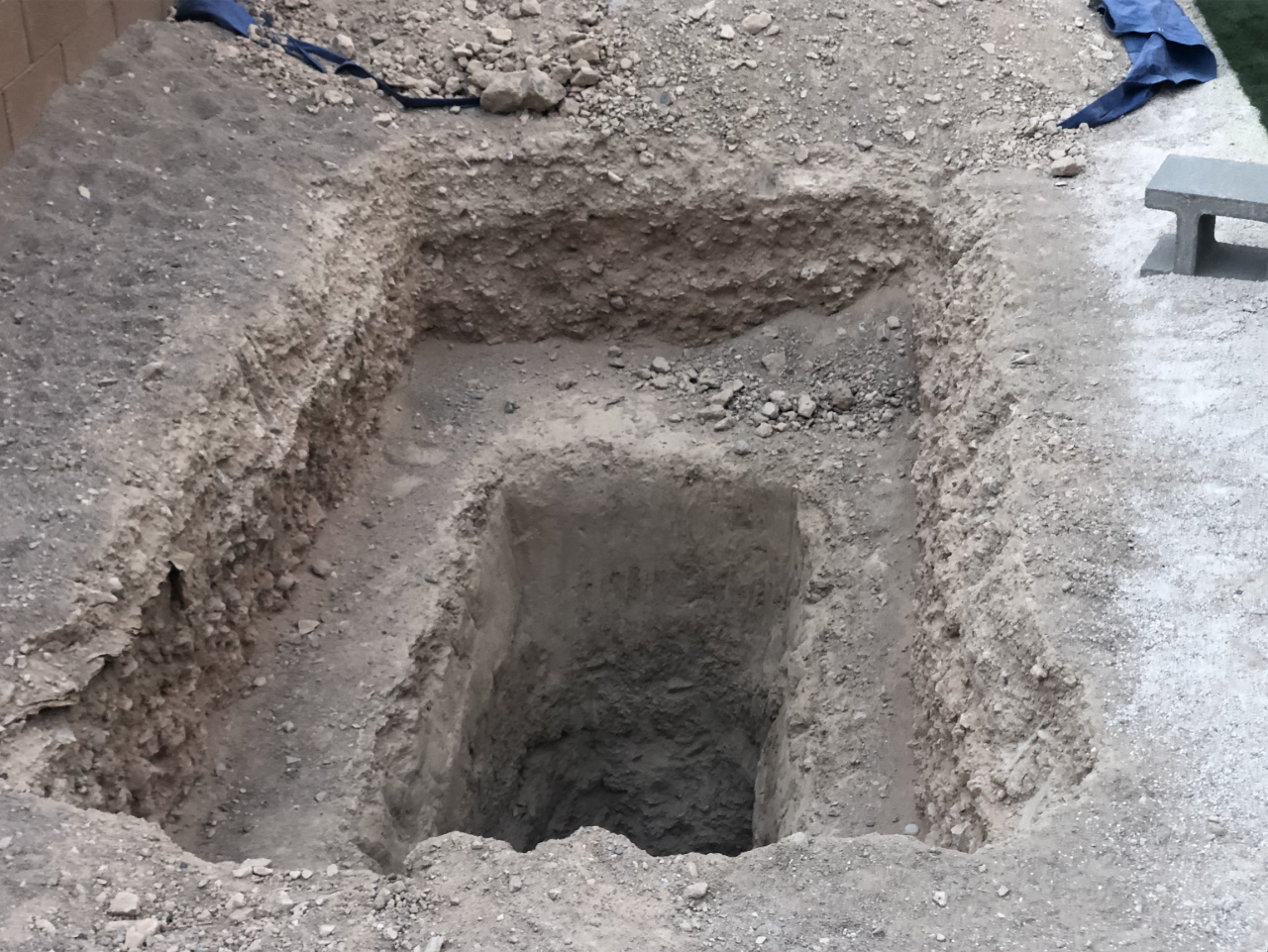 Hole in backyard of home where child's body found