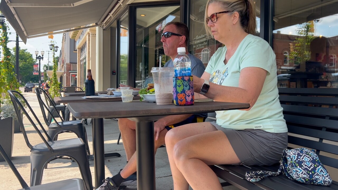 Aaron & Kismet Lock sit down to eat in Mason