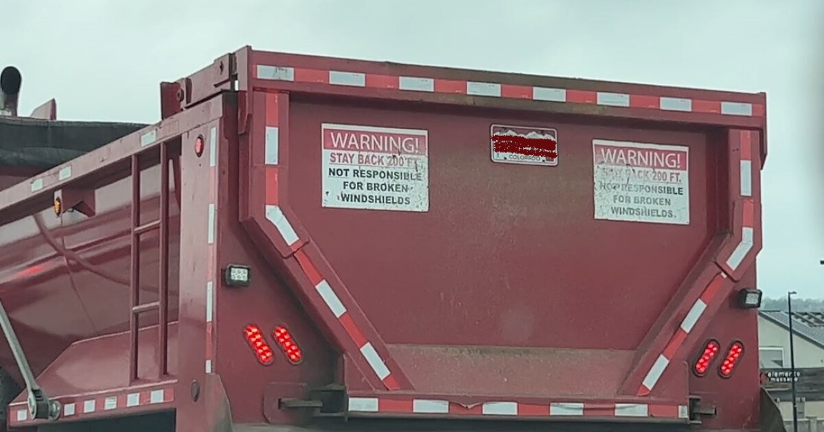 Are trucks with 'not responsible for broken windshield' signs protected? - Vimarsana News
