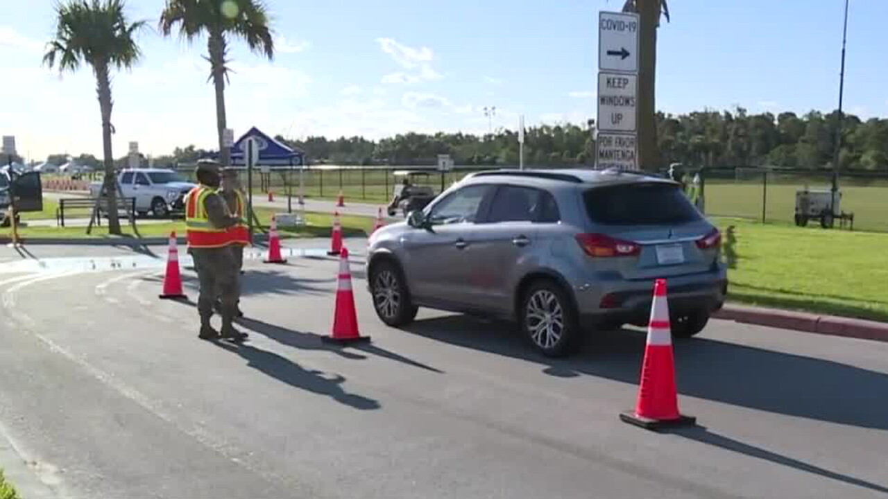 SUV arrives for coronavirus testing site at FITTEAM Ballpark of the Palm Beaches