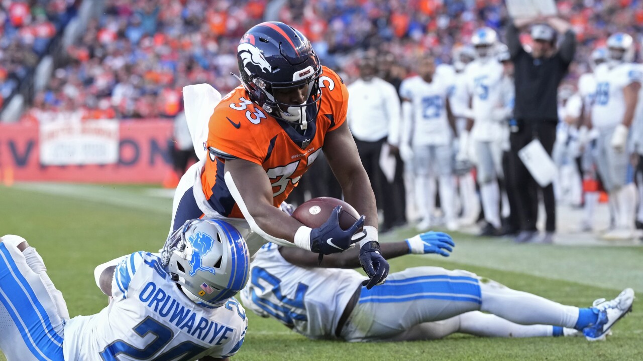 Javonte Williams APTOPIX Lions Broncos Football