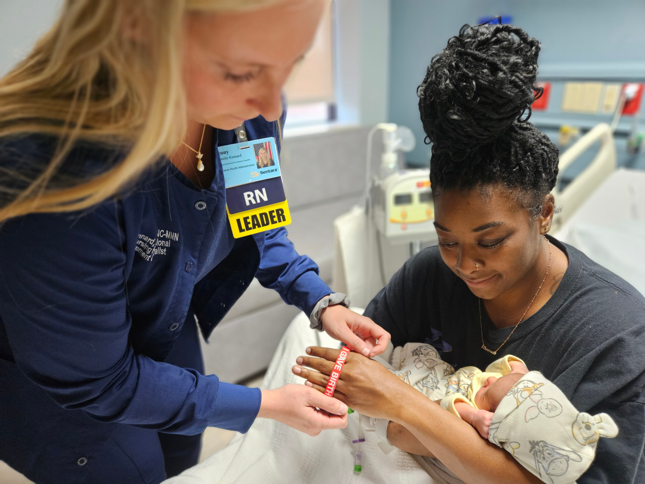 Nurse Jenny Kennard is giving moms bracelets to remind them and their doctors that women are at an increased risk of dying after giving birth. Photo credit: Sentara Health.
