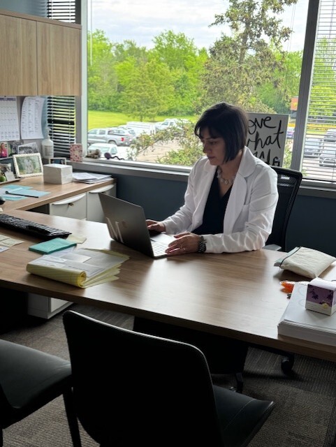 genome dr at desk.jpg