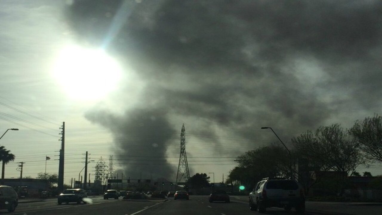 PHOTOS: Fire burns at PHX recycling plant