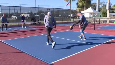 People playing pickleball in Naples