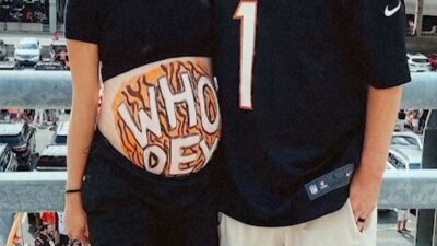 Brydon Lustig shows off her Bengals-painted baby bump