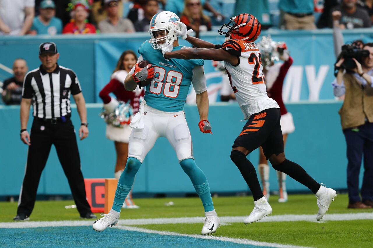 Cincinnati Bengals safety Williams Jackson pushes Miami Dolphins tight end Mike Gesicki in 2019