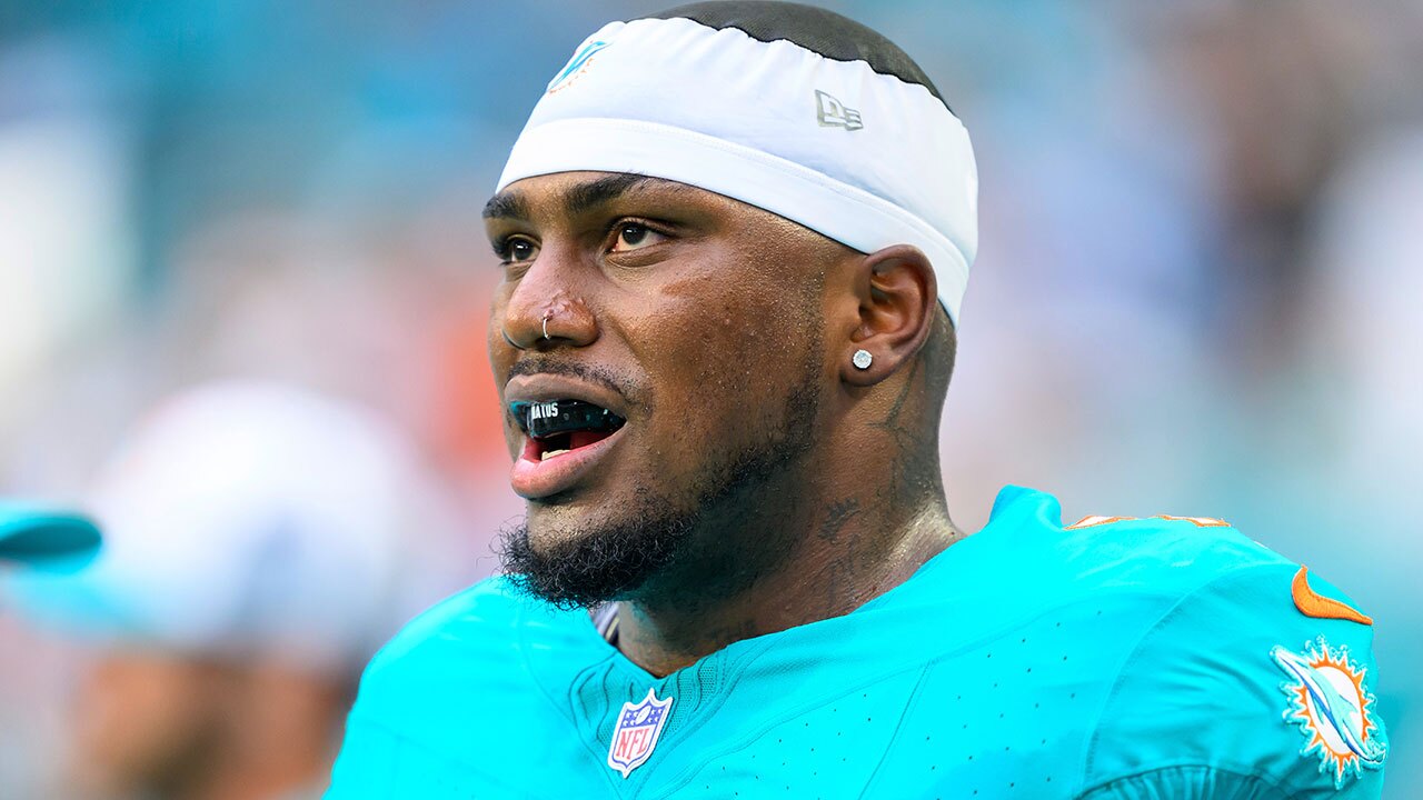 Miami Dolphins tackle Bayron Matos (79) stands on the sidelines before the start of a preseason NFL football game against the Atlanta Falcons, Friday, Aug. 9, 2024, in Miami Gardens, Fla. 