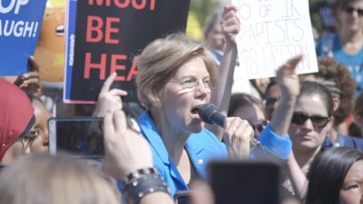 U.S. Sen. Elizabeth Warren speaking at the protest.