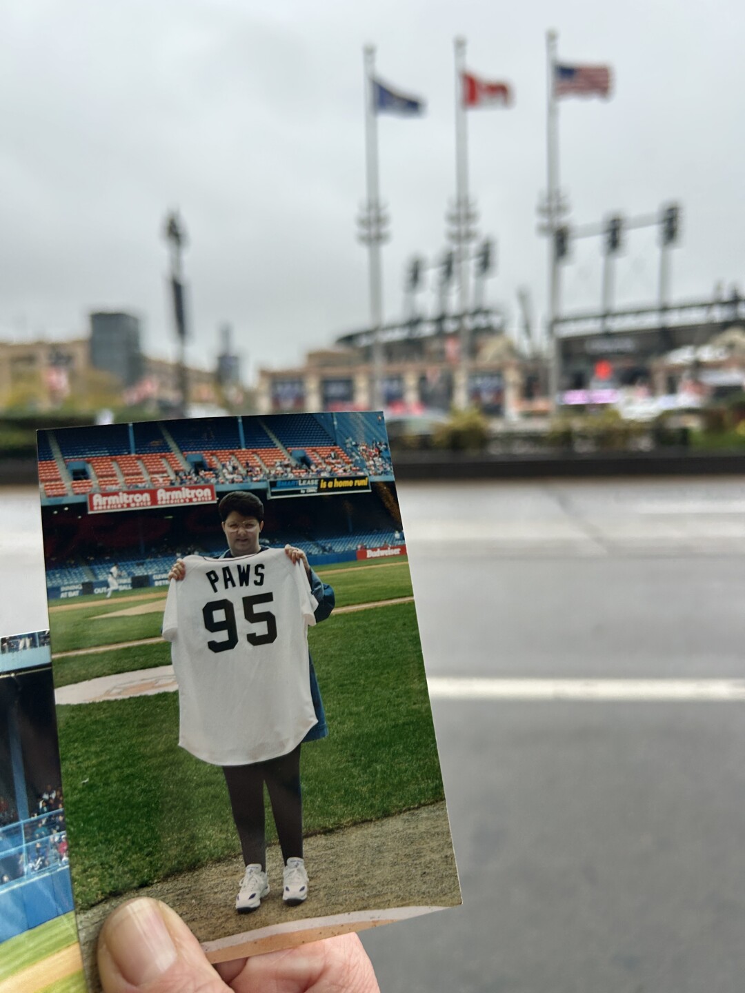 Mary Ellen Vultaggio with her photo of the jersey she received 30 years ago