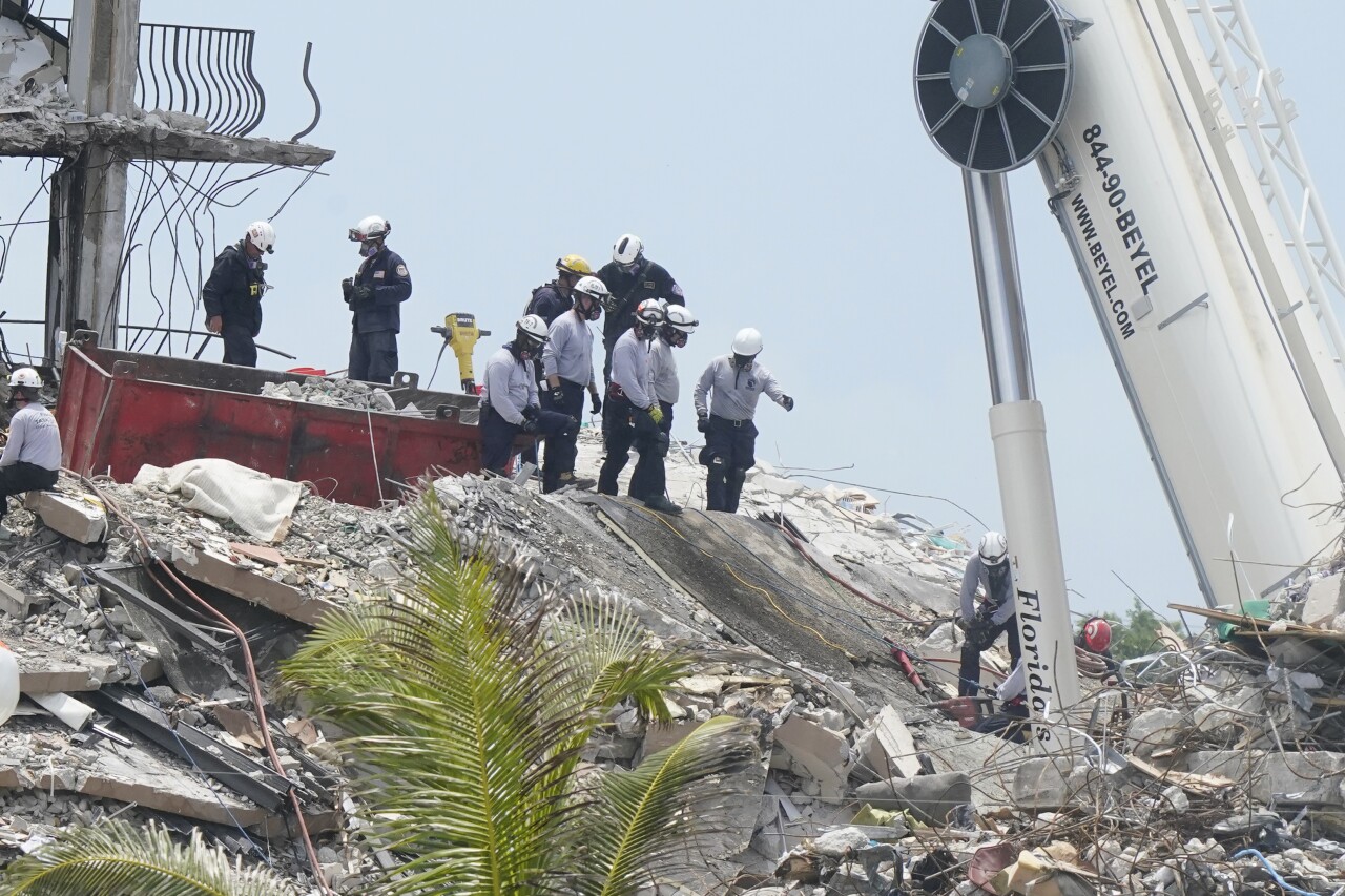 Rescuers cut into slab of concrete at Champlain Towers South condo collapse site, June 28, 2021