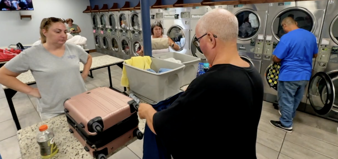 Flaherty family cleans up mud-soaked clothing