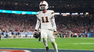 Miami quarterback Carson Beck scores a touchdown during the second half of the Fiesta Bowl NCAA college football playoff semifinal game against Mississippi, Thursday, Jan. 8, 2026, in Glendale, Ariz. 