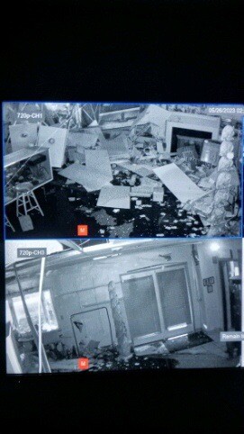 Security camera notification of car hitting building