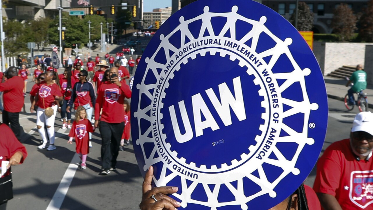 Auto Workers Strike Pay
