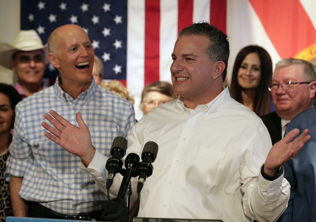 Rick Scott and Jimmy Patronis during 2018 rally