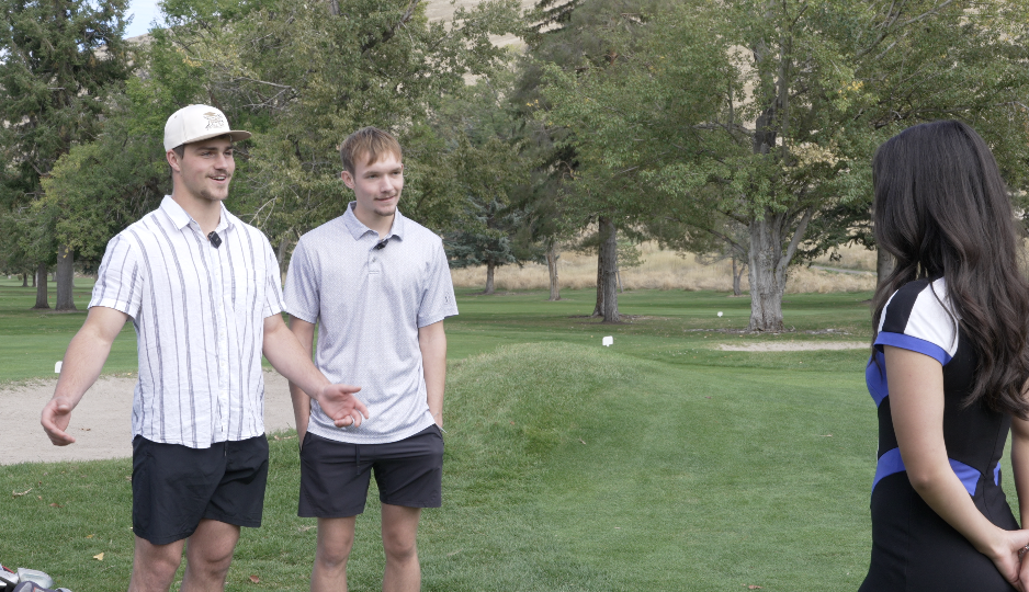 Brock Benson and Colton Woodard, University of Montana students, participating in Saturday's celebration.