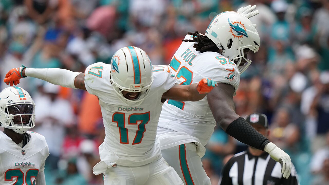 Miami Dolphins' Jaylen Waddle celebrates a touchdown during the first half of an NFL football game against the Buffalo Bills, Sunday, Nov. 9, 2025, in Miami Gardens, Fla.