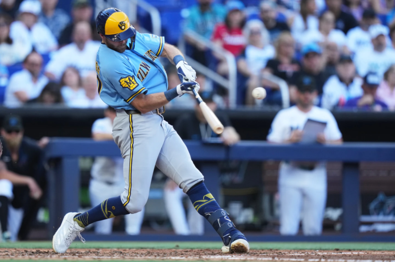 Milwaukee Brewers' Brandon Lockridge hits an RBI single to score Luis Rengifo during the fourth inning of a baseball game against the Miami Marlins, Saturday, April 18, 2026, in Miami.